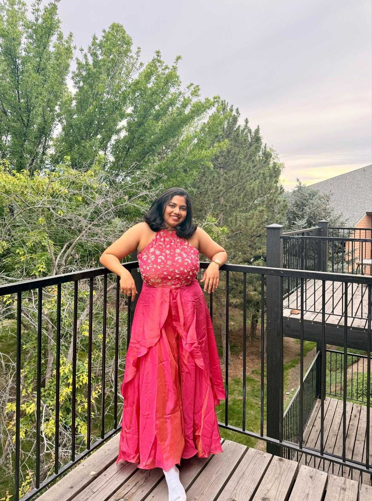 Kruthi wearing her custom pink outfit