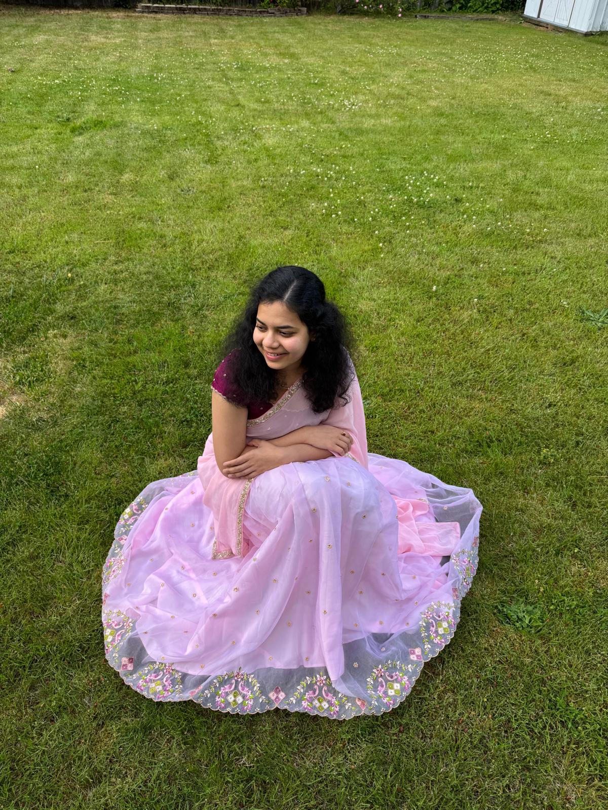 Sahithi wearing her custom pink outfit